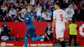 Real Madrid's Sergio Ramos celebrates scoring their second goal against Sevilla