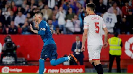 Real Madrid's Sergio Ramos celebrates scoring their second goal against Sevilla