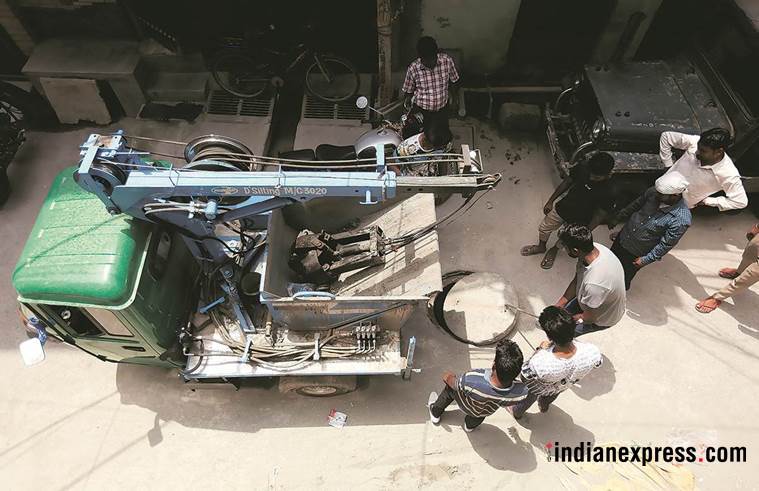 sewage worker death, delhi sewage system, rainwater harvesting pits, sewage treatment plant, sewage cleaners in delhi, indian express