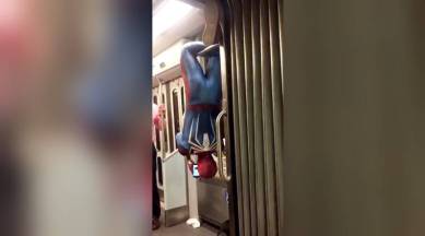 WATCH: Spider-Man hangs upside down on a train; don't try this at home (or,  on the subway)! | Trending News,The Indian Express