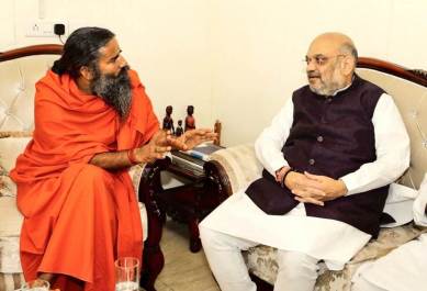 BJP president Amit Shah with Yoga guru Ramdev on Monday. (Twitter/@AmitShah)