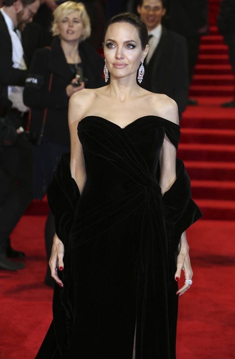 Angelina Jolie exudes royalty in a stunning Ralph and Russo dress; see ...