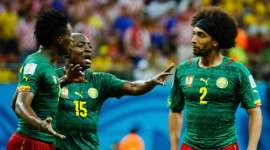 Cameroon’s Weboc tries to separate Moukandjo and Assou-Ekotto as they argue during their 2014 World Cup Group A soccer match against Croatia at the Amazonia arena in Manaus Cameroon's Achille Weboc (C) tries to separate teammates Benjamin Moukandjo (L) and Benoit Assou-Ekotto as they argue during their 2014 World Cup Group A soccer match against Croatia at the Amazonia arena in Manaus