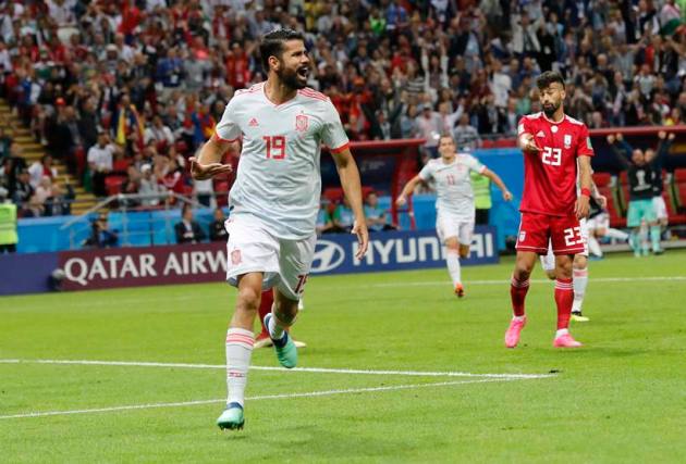 Spain's Diego Costa celebrate after scoring his side's opening goal during the group B match between Iran and Spain at the 2018 soccer World Cup in the Kazan Arena in Kazan
