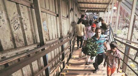 Mumbai: Officials keep eye on crowd on foot overbridge during rains