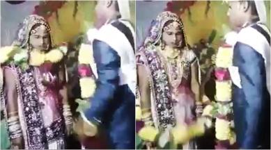 WATCH: This groom's unique style of putting garland on his bride has left  people LOL-ing | Trending News,The Indian Express