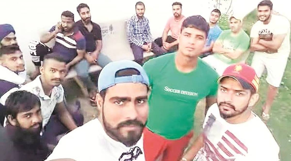 Sampat Nehra takes a selfie with Lawrence Bishnoi (in red cap) and other gang members. (Express photo)