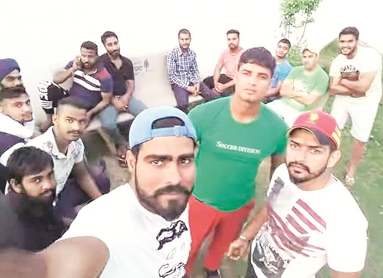 Sampat Nehra takes a selfie with Lawrence Bishnoi (in red cap) and other gang members. (Express photo)