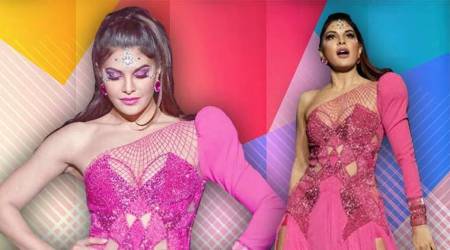 Jacqueline Fernandezs sultry pink gown, glittery boots, face art are perky but not impressive
