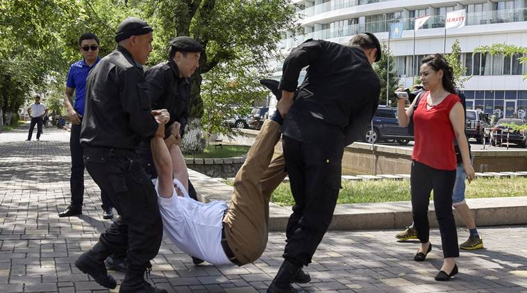 Kazakhstan police detain dozens at anti-government rally