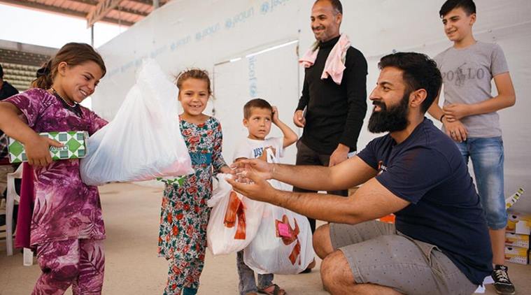 Spreading smiles, UK Sikh NGO gives Eid gifts to over 500 