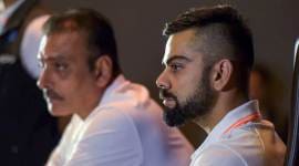 Indian cricket captain Virat Kohli (R) and head coach Ravi Shastri during a press conference ahead of the team's departure for England and Ireland, in New Delhi