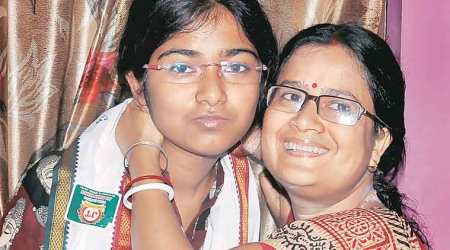 Sanjeevani Debnath topped the exam with 98.4 per cent marks, in Cooch Behar. (PTI Photo)