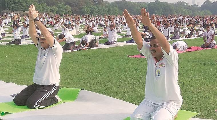 At a yoga session in Maidan, Kolkata, on Thursday. (Express photo/Partha Paul)