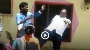 Watch: Telangana local body chief ‘kicks’ woman in chest over land dispute