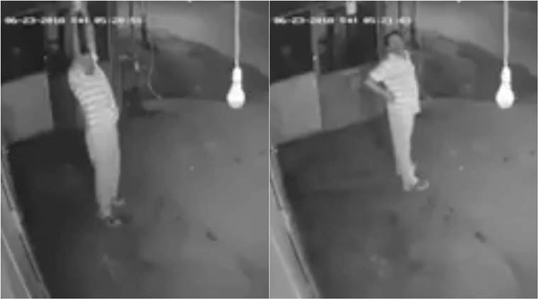 man steals bulb, man steals bulb exercise, man exercise bulb theft, bulb theft video, bulb theft viral video, indian express, indian express news