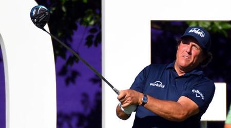 Phil Mickelson hits his tee shot on the 13th hole during the first round of the FedEx St. Jude Classic golf tournament at TPC Southwind in Memphis, Tenessee