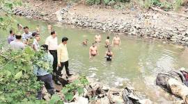 After futile search for missing head, family accepts body of decapitated murder victim, conducts last rites