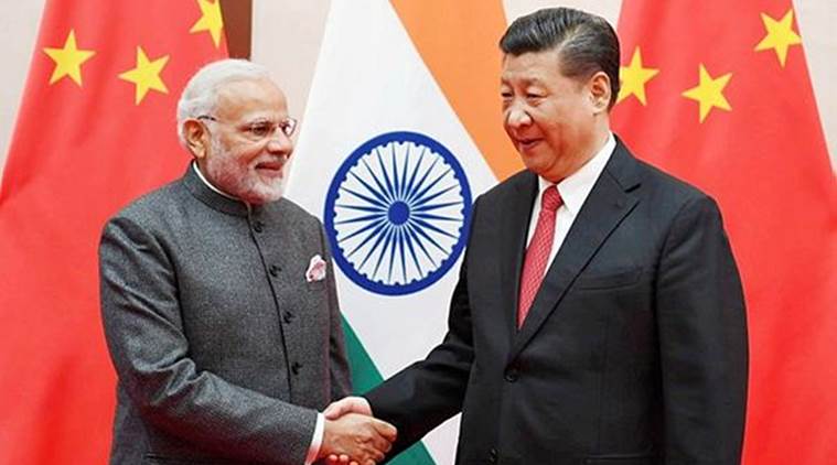 Prime Minister Narendra Modi with Chinese President Xi Jinping in Qingdao in China on Saturday. (Reuters)