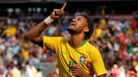 Neymar celebrates scoring their first goal. (Source: Reuters)