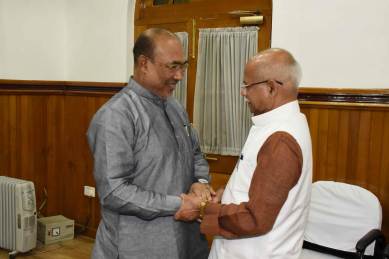 Manipur Chief Minister N Biren Singh meets Union Minister Pratap Shukla in Imphal on Monday. (Express photo)