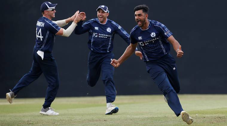 Scotland's Safyaan Sharif celebrates winning the match