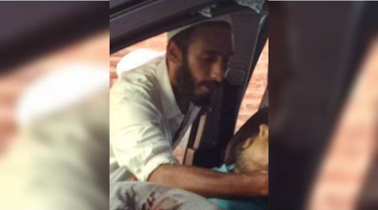 Taking to Facebook, police posted the photograph of a man who is seen touching the deceased's body, and sought the help of the general public to identify the suspect.