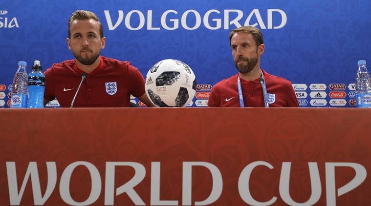 England's Harry Kane, left and England head coach Gareth Southgate arrive for a press conference for the 2018 soccer World Cup, at the Volgograd Arena in Volgograd, Russia