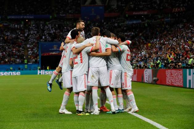 Spain players celebrate their side's opening goal by Spain's Diego Costa during the group B match between Iran and Spain at the 2018 soccer World Cup in the Kazan Arena in Kazan