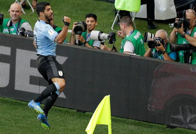 Uruguay's Luis Suarez celebrates after scoring the opening goal during the group A match between Uruguay and Saudi Arabia at the 2018 soccer World Cup