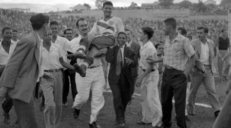 FILE - In this June 28, 1950 file photo, U.S. center forward Joe Gaetjens is carried off by cheering fans after his team beat England 1-0 in a World Cup soccer match in Belo Horizonte, Brazil. Gaetjens scored the only goal in what remains one of the biggest shocks in the tournament's history. The 21st World Cup begins on Thursday, June 14, 2018, when host Russia takes on Saudi Arabia. (AP Photo/File)