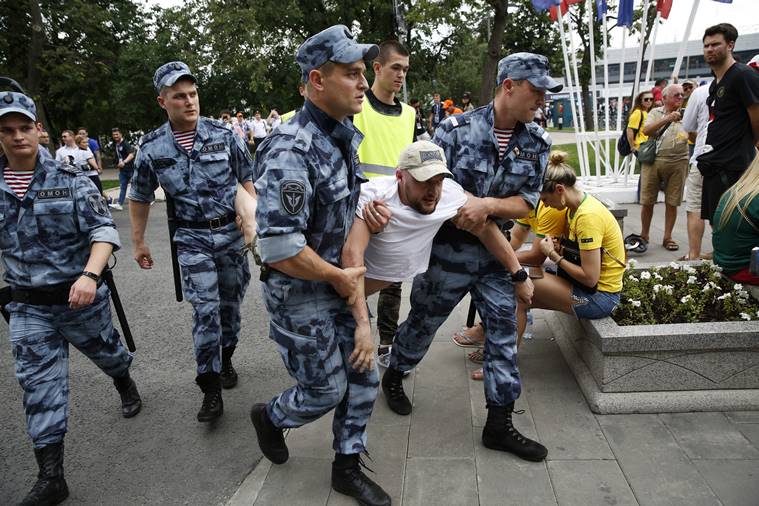 French police clash with unruly fans, clear Champs Elysees