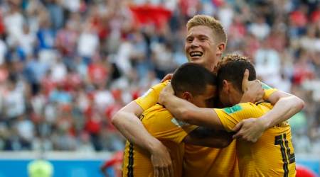 Belgium's Kevin De Bruyne, face to camera, and Belgium's Dries Mertens, right, celebrate with Belgium's Eden Hazard after Hazard scored his side's second goal during the third place match between England and Belgium at the 2018 soccer World Cup in the St. Petersburg Stadium in St. Petersburg, Russia, Saturday, July 14, 2018. (AP Photo/Petr David Josek)
