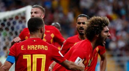Belgium's Marouane Fellaini, right, celebrates with teammates after scoring his side's second goal during the round of 16 match between Belgium and Japan at the 2018 soccer World Cup in the Rostov Arena, in Rostov-on-Don, Russia, Monday, July 2, 2018. (AP Photo/Natacha Pisarenko)