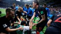 Mario Mandzukic, Luka Modric welcome World Cup photographer to Croatia