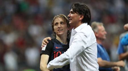 Soccer Football - World Cup - Semi Final - Croatia v England - Luzhniki Stadium, Moscow, Russia - July 11, 2018 Croatia's Luka Modric and coach Zlatko Dalic celebrate after the match REUTERS/Carl Recine