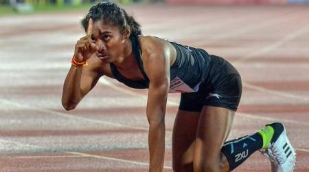Guwahati: Hima Das from Assam state celebrates after winning the womens 400 meters event at the 58th National Inter-State Athletic Championship 2018 at Indira Gandhi Athletic Stadium in Guwahati on Friday, June 29, 2018. (PTI Photo)(PTI6_29_2018_000215B)