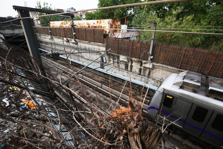 Delhi Metro Violet Line service disrupted due to rain, boundary wall falls on coach