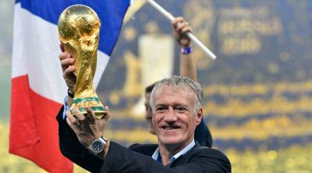 France head coach Didier Deschamps lifts the trophy after France beat Croatia by 4-2 during the final match between France and Croatia at the 2018 soccer World Cup in the Luzhniki Stadium in Moscow, Russia, Sunday, July 15, 2018. (AP Photo/Martin Meissner)
