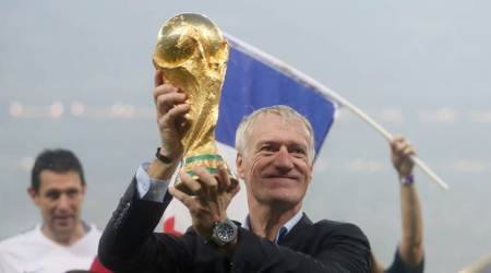 Soccer Football - World Cup - Final - France v Croatia - Luzhniki Stadium, Moscow, Russia - July 15, 2018   France coach Didier Deschamps celebrates with the trophy after winning the World Cup               REUTERS/Carl Recine