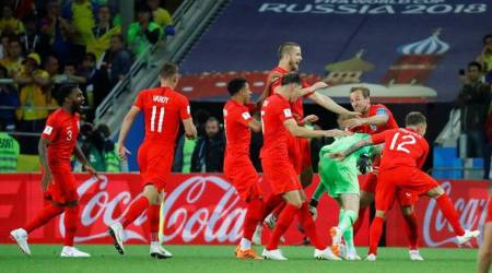 Soccer Football - World Cup - Round of 16 - Colombia vs England - Spartak Stadium, Moscow, Russia - July 3, 2018  England's Jordan Pickford and team mates celebrate winning the penalty shootout   REUTERS/Kai Pfaffenbach