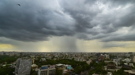 Ahmedabad:Dark evening clouds gather over the city skyline, in Ahmedabad on Monday, July 02, 2018. (PTI Photo/Santosh Hirlekar)(PTI7_2_2018_000172B)