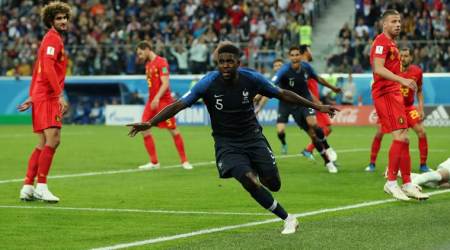 Soccer Football - World Cup - Semi Final - France v Belgium - Saint Petersburg Stadium, Saint Petersburg, Russia - July 10, 2018  France's Samuel Umtiti celebrates scoring their first goal   REUTERS/Lee Smith