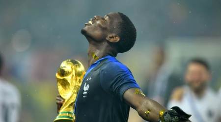 Soccer Football - World Cup - Final - France v Croatia - Luzhniki Stadium, Moscow, Russia - July 15, 2018  France's Paul Pogba holds the trophy as he celebrates winning the World Cup  REUTERS/Dylan Martinez     TPX IMAGES OF THE DAY  SEARCH "FIFA BEST" FOR ALL PICTURES.