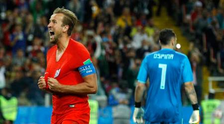 England's Harry Kane celebrates after scoring his side's first goal during the round of 16 match between Colombia and England at the 2018 soccer World Cup in the Spartak Stadium, in Moscow, Russia, Tuesday, July 3, 2018. (AP Photo/Victor R. Caivano)