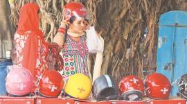 Chandigarh women wearing helmet as per new law