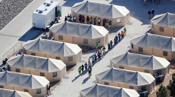 Hundreds of migrant children quietly moved to a tent camp on the Texas border