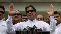 Imran Khan speaks to members of media after casting his vote at a polling station during the general election in Islamabad no alt set