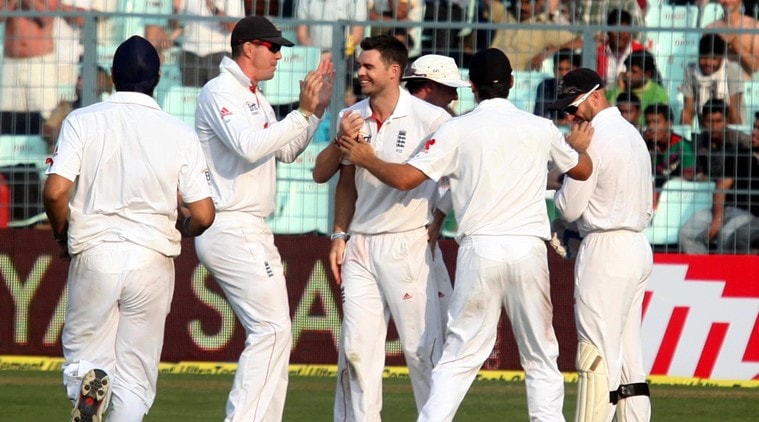 Englands bowler James Anderson celebrates with teammates after taking the wicket of R Ashwin on day one of the third Test match against England in Kolkata on Wednesday