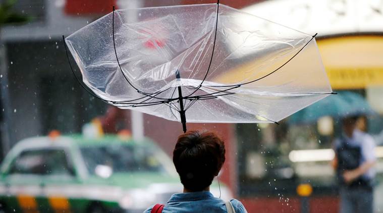 Japan, Japan tropical storm, Jongdari, Japan storm, Japan flights, Japan heavy rain, world news, Indian Express news
